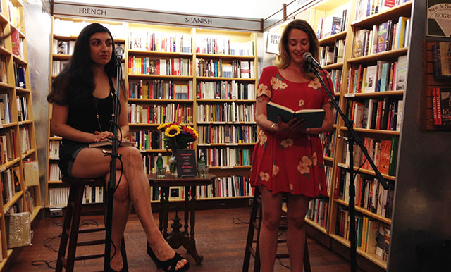 Elif Batuman looks on while Emily Gould reads from her new novel, Frienship, at McNally Jackson books in Manhattan